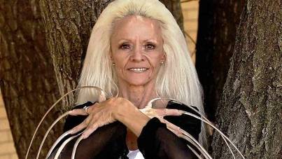 10 More Bizarre World Records 6. Female Longest Fingernails 10 More Bizarre World Records