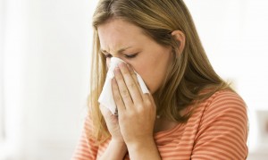 woman-allergies-blow-nose-sneeze-spry