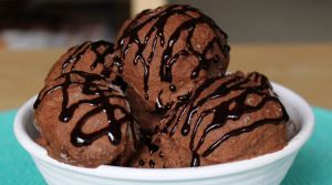 chocolate-ice-cream-in-a-bowl-with-chocolate-syrup