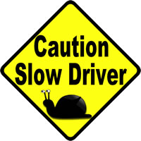 slow-driver-car-window-warning-sign