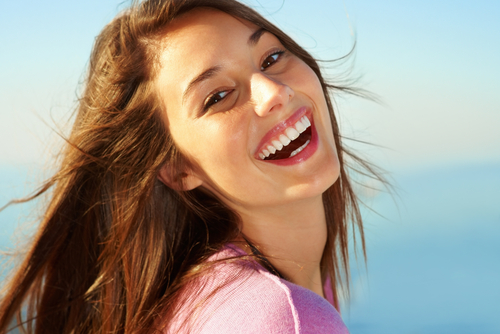 woman-laughing-and-smiling