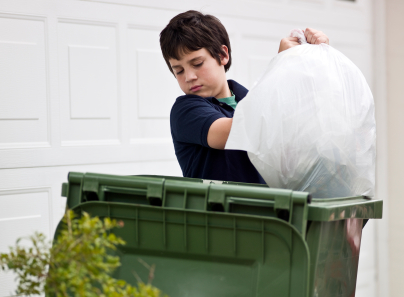 boy-taking-out-trash